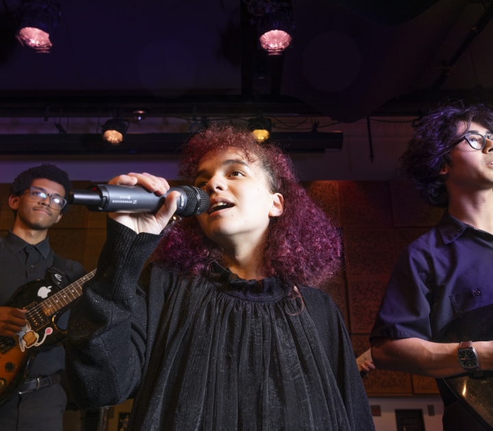 music student singing in microphone