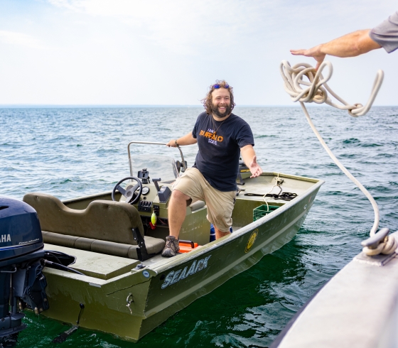 Ben Szczygiel in a boat