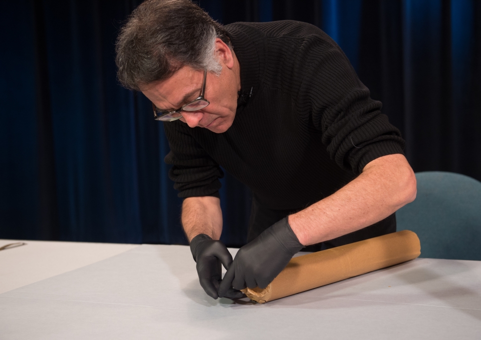 Patrick Ravines works on opening early 19th Century platinotype paper cannister